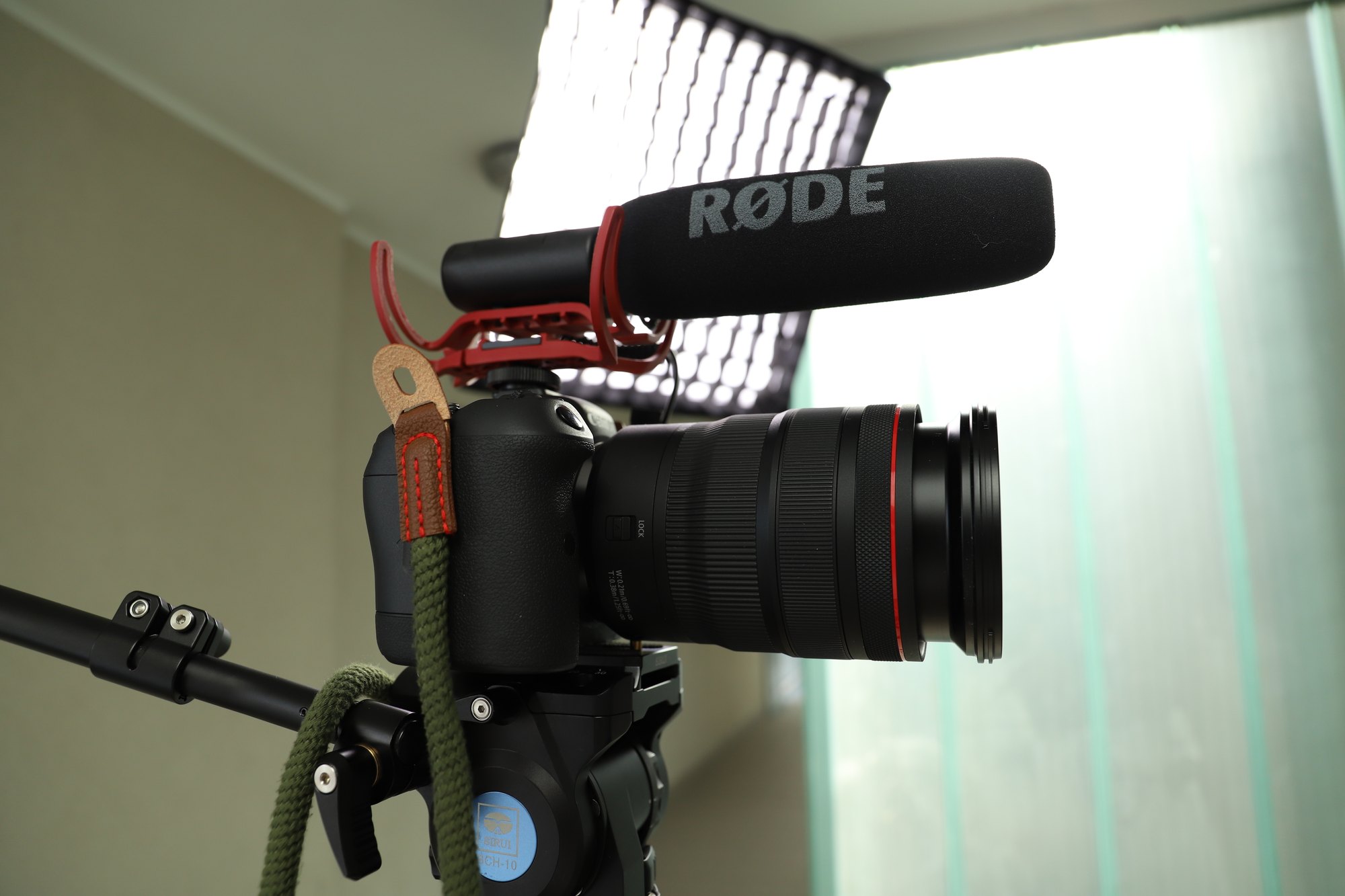 Camera and lighting setup during a film production
